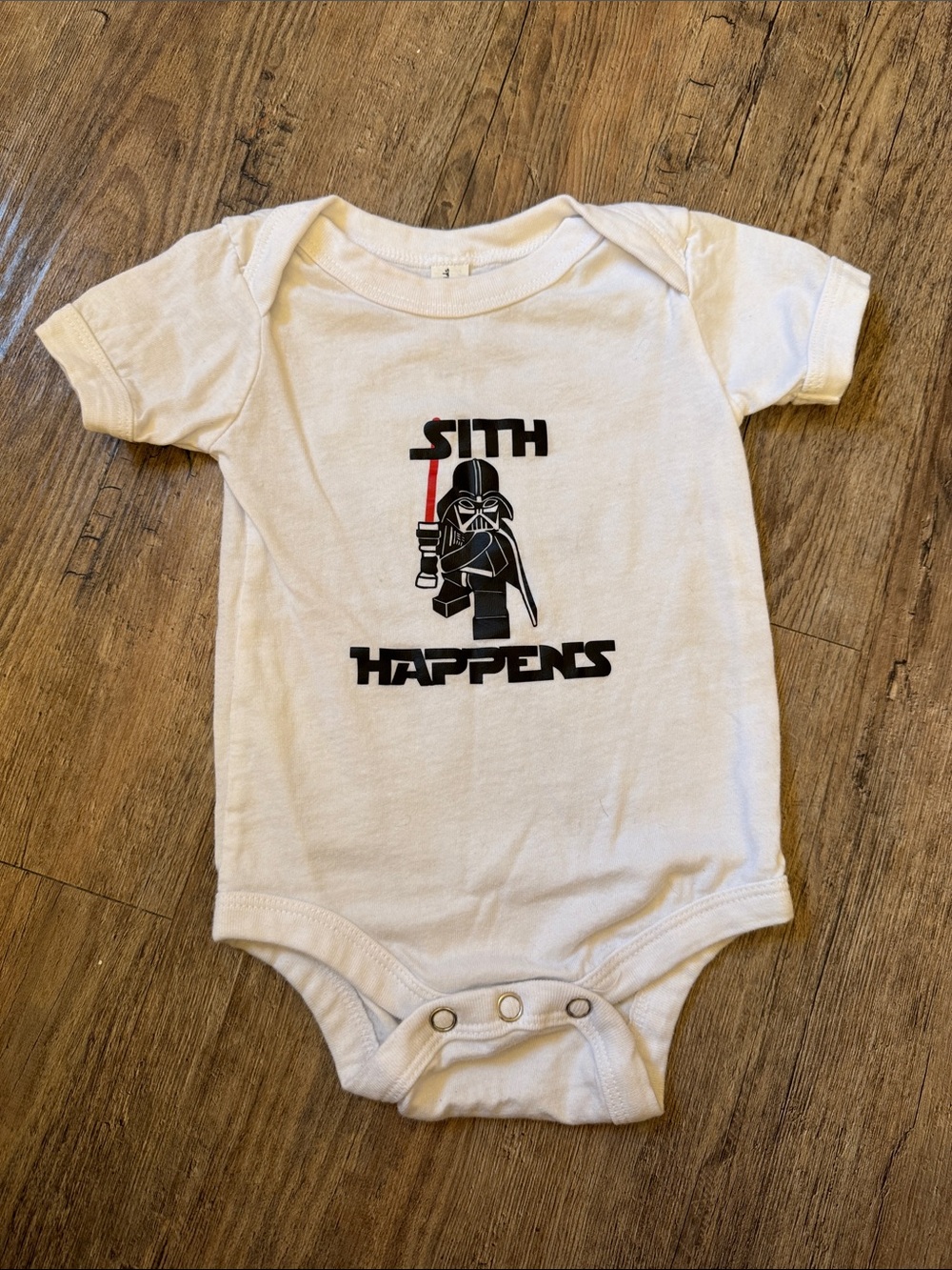 Bella Canvas White Baby Bodysuit with Black & Red Sith Graphic
